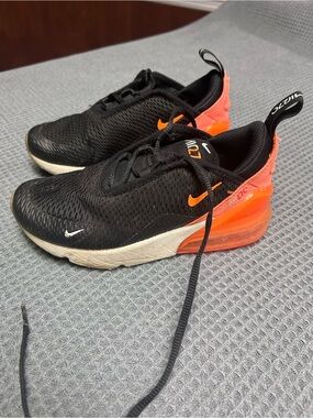 Nike Kids Black Sneakers with Orange Heel Accent